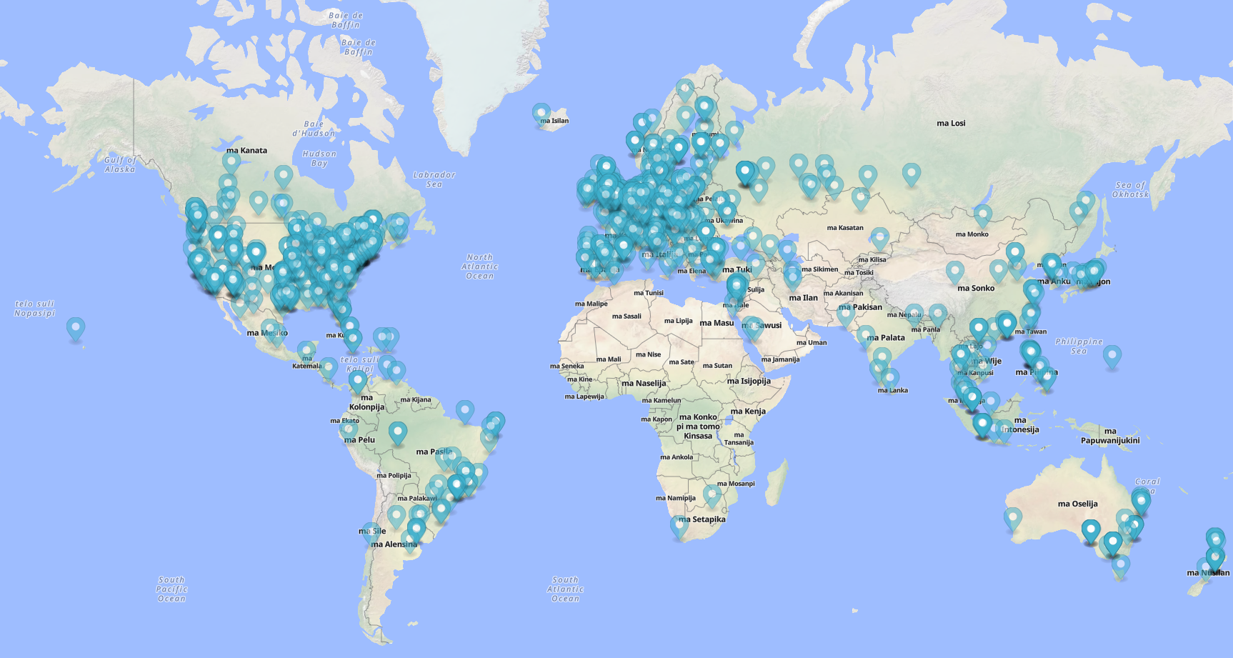 A world map with hundreds of pins
